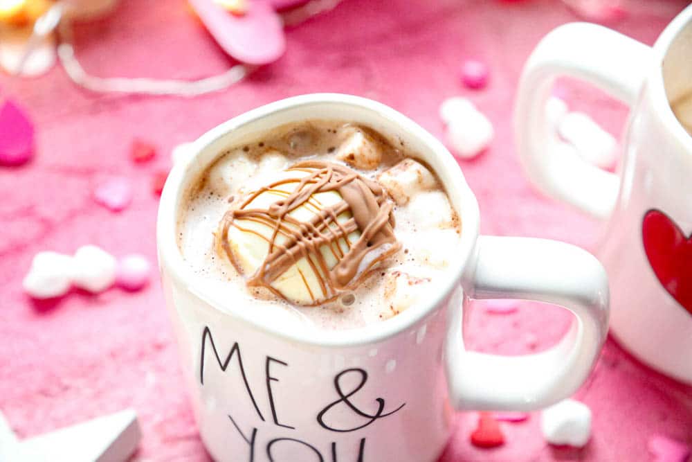 giant Rae Dunn mug with marshmallows, hot chocolate, and heavy cream