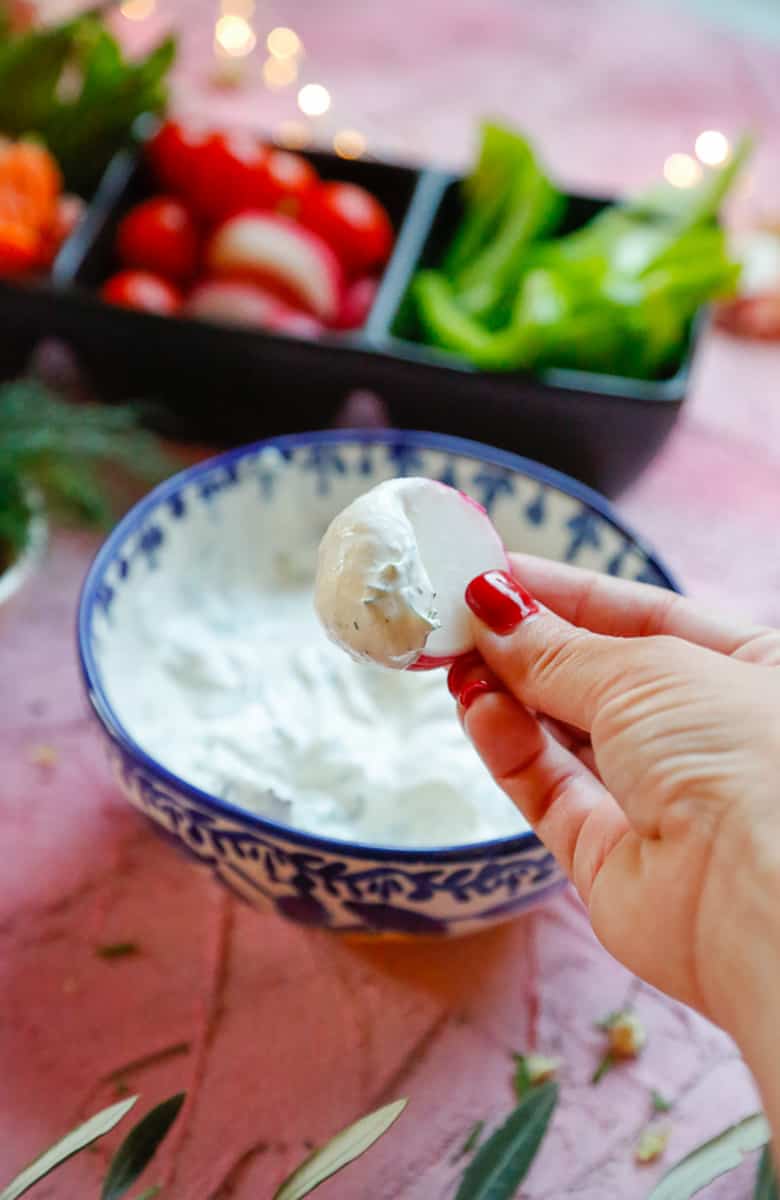a radish with ranch dip and veggies 
