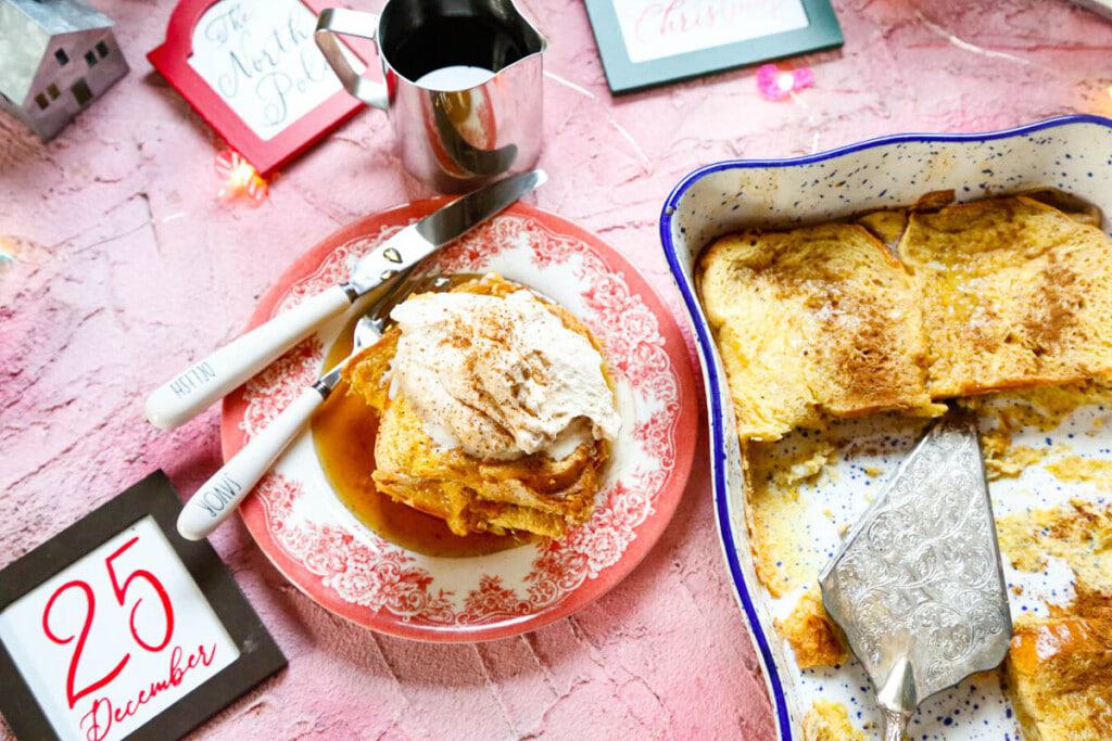 a plate and casserole dish of easy baked eggnog french toast