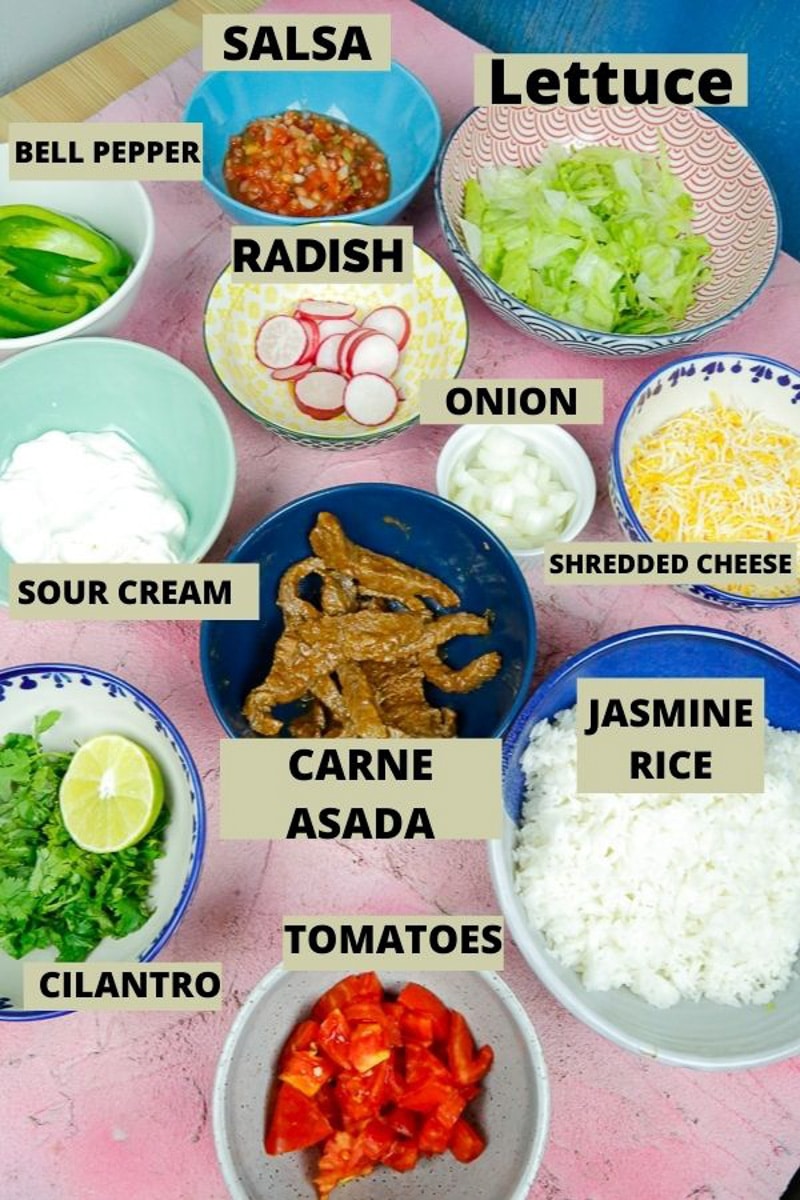 Ingredients for beef burrito bowls jasmine rice, carne asada, cilantro, sour cream, radish, onion, shredded cheese, tomatoes 