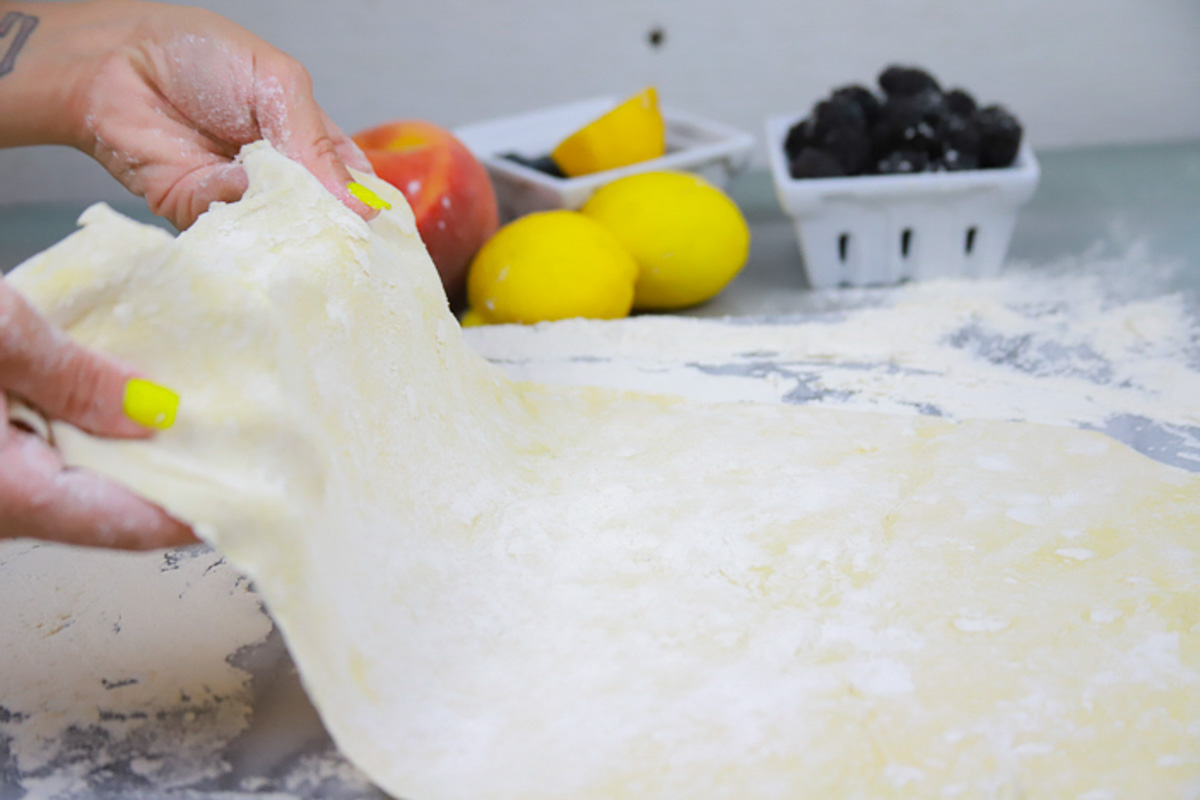 roll out the thawed puff pastry on a floured surface 