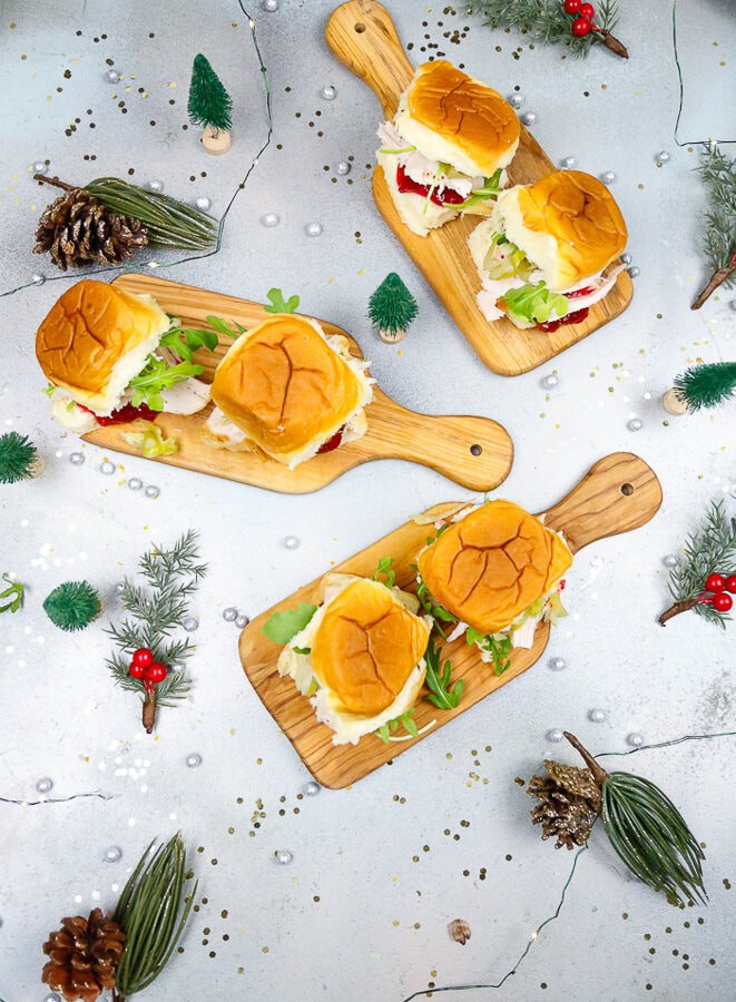 flatlay of turkey sandwiches sitting on mini cutting boards