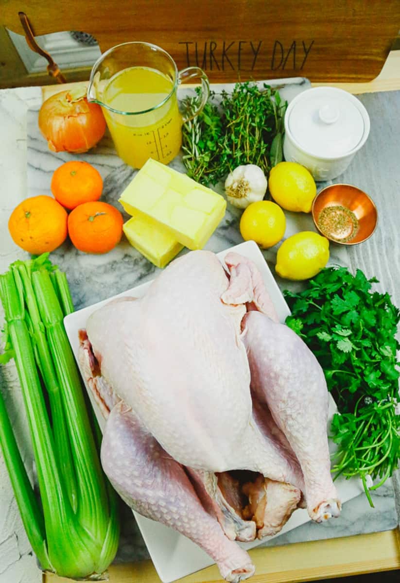 organic turkey aw turkey, parsley, celery, butter, Mandarin oranges, lemons, chicken stock, white onion, rosemary, thyme, garlic salt pepper  