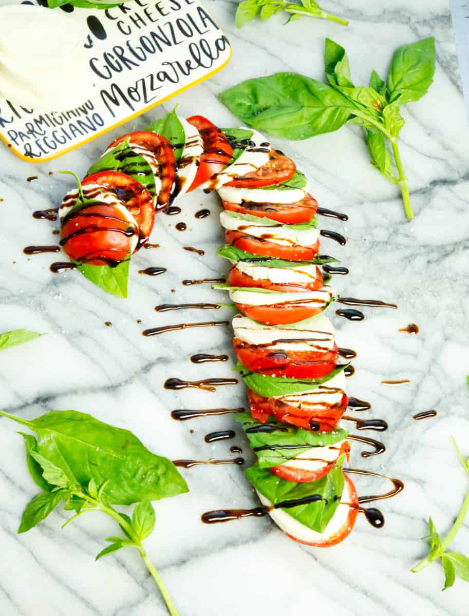 Candy Cane Caprese Salad with balsamic drizzle and sea salt 