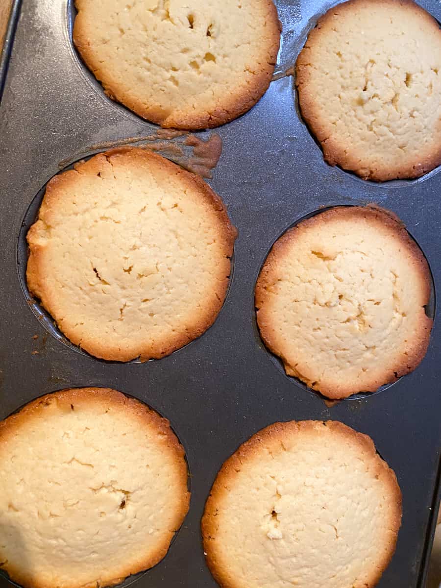 cooked mini lemon bundt cakes in a mini lemon bundt cake pan 