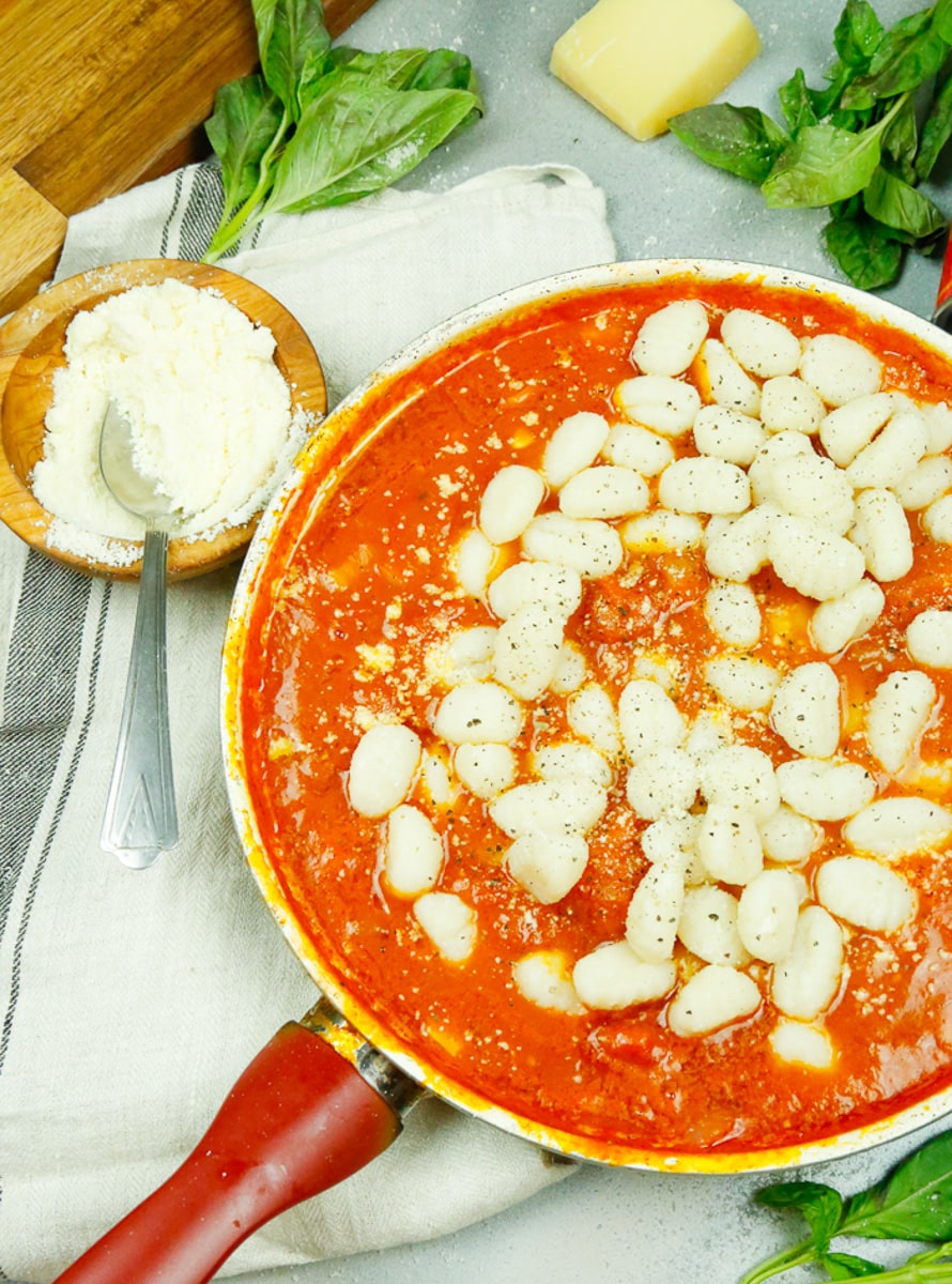 Step 4: Remove the gnocchi from the water and add it to the simmering sace. Simmer the pasta and sauce together for an additional 3-5 minutes.