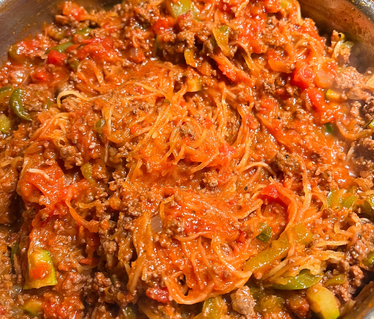 cook the spaghetti squash and marinara sauce together in a large saucepan 