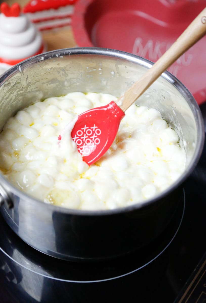 melt the mini marshmallows in a saucepan over medium heat until melted 