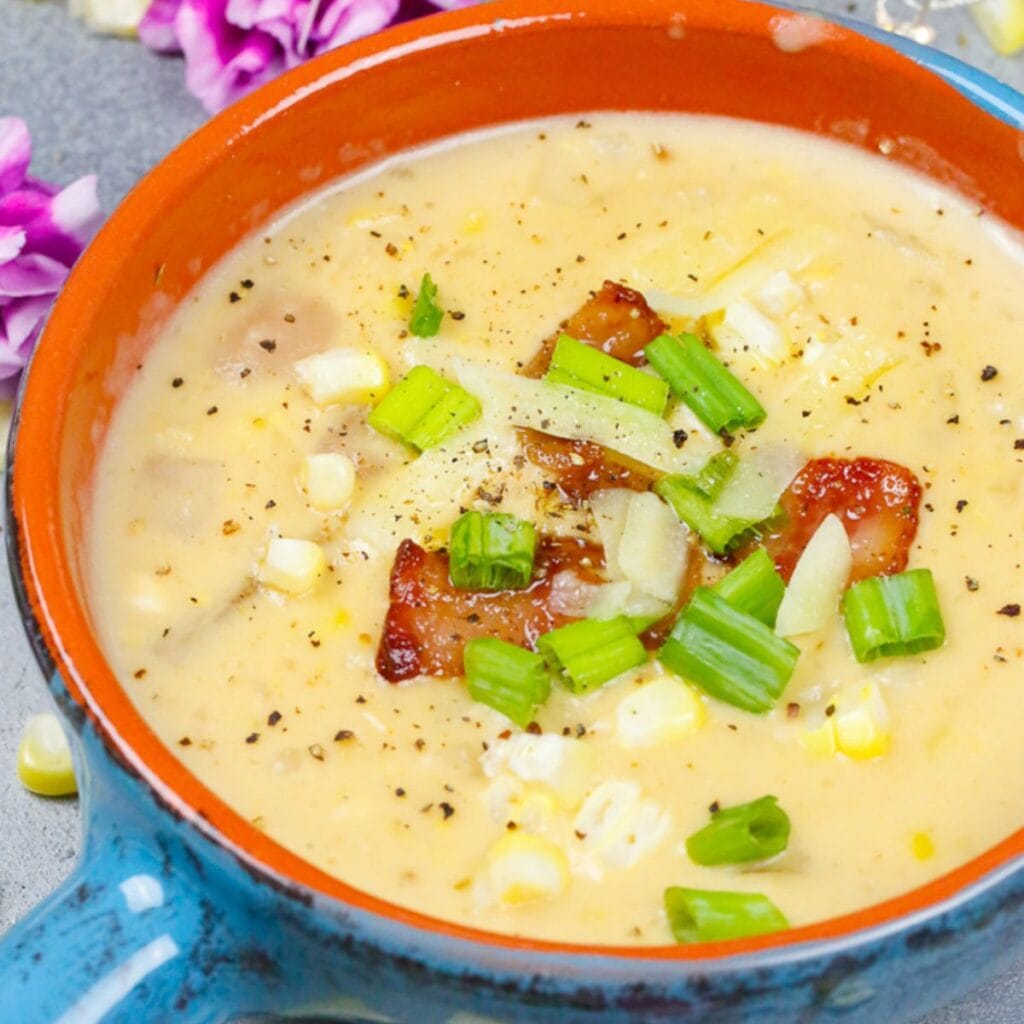 chicken broth comforting bowl of soup rolling boil fresh salad couple of leeks empty corn cobs new favorite little water chunky texture gold potatos spent cobs better way half of the corn creamy consistency