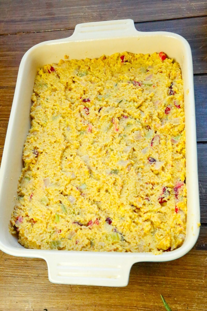 In a 9x13 greased baking dish, add the prepared cornbread stuffing and bake in a preheated oven at 350 degrees for 30-45 minutes or until the cornbread stuffing turns golden brown.