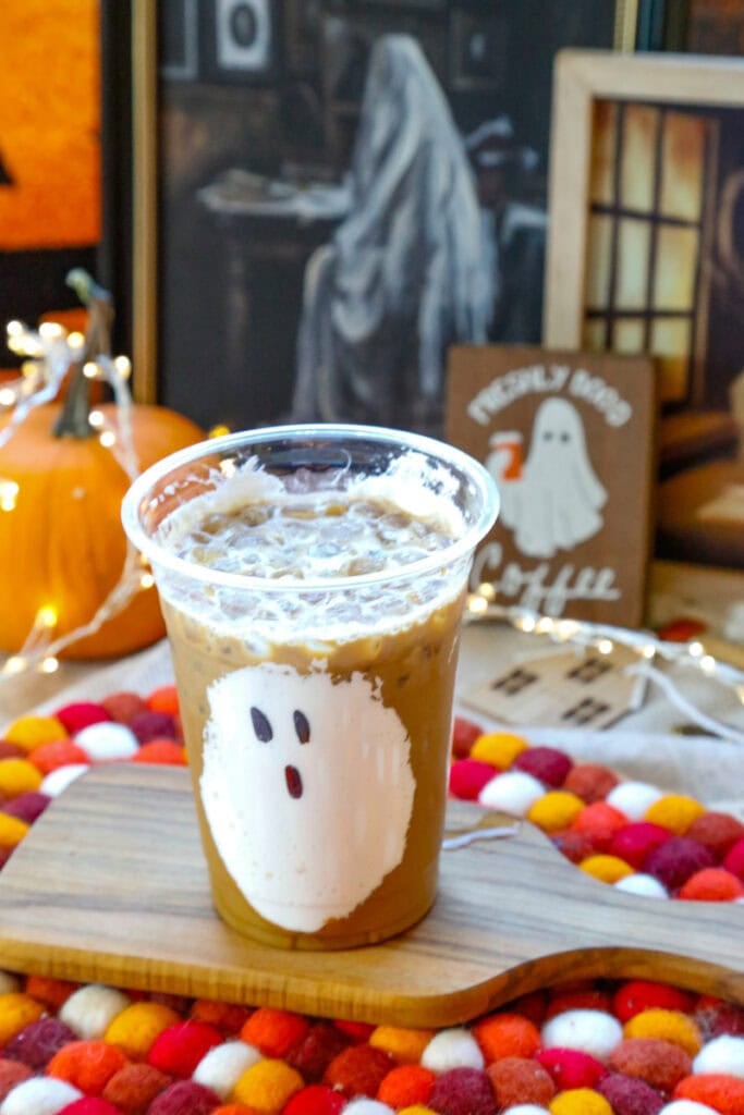 Pour the pumpkin spiced iced coffee over the ice in the ghost coffee cup and top with milk of choice. You could also do pumpkin cold foam on top. Recipe for that below! 