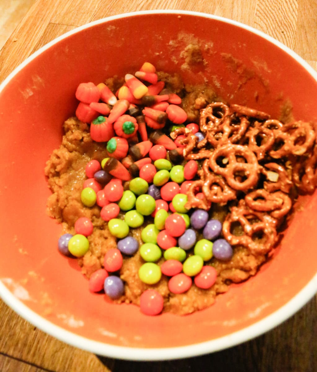 Fold in ½ cup each pretzels, cookies, and chocolate chips.