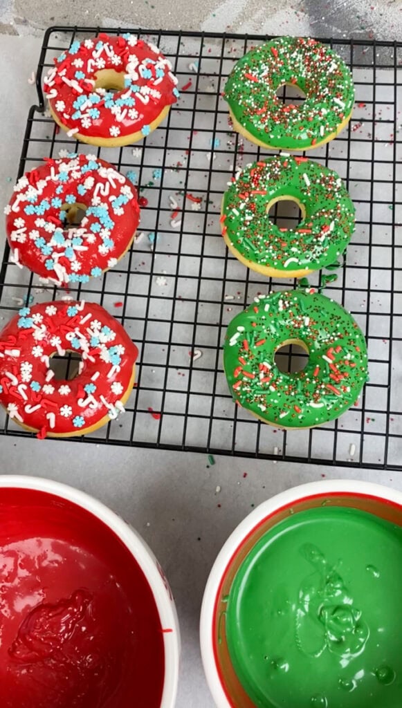 Top with the sprinkles and more icing glaze if desired. Decorate your Christmas Donuts however you want. The more creative and fun, the better! Let stand for 10-minutes before adding to a donut box or gift package.