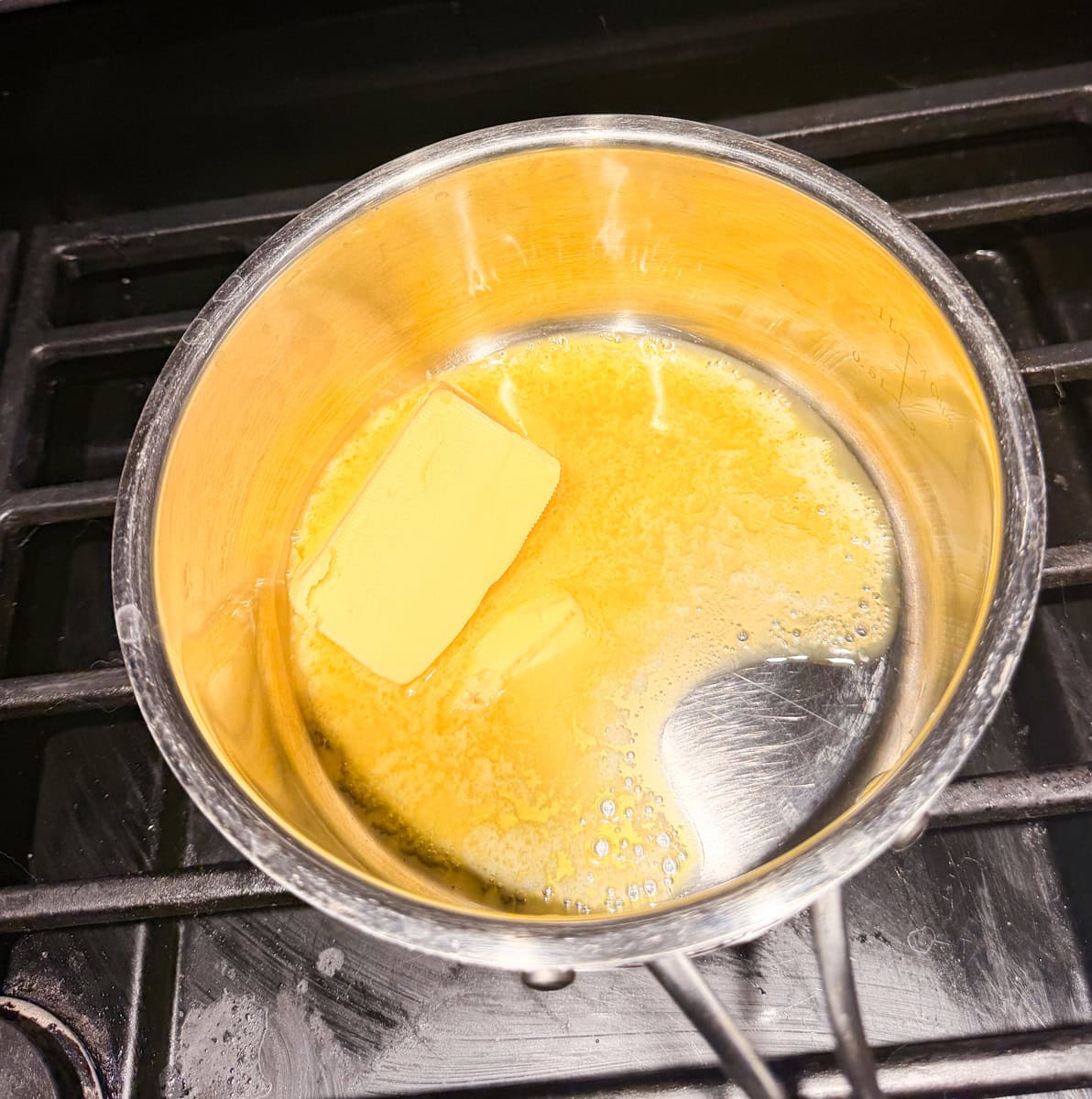 Melt the butter and keep it on the warm setting while you Pop the Popcorn.