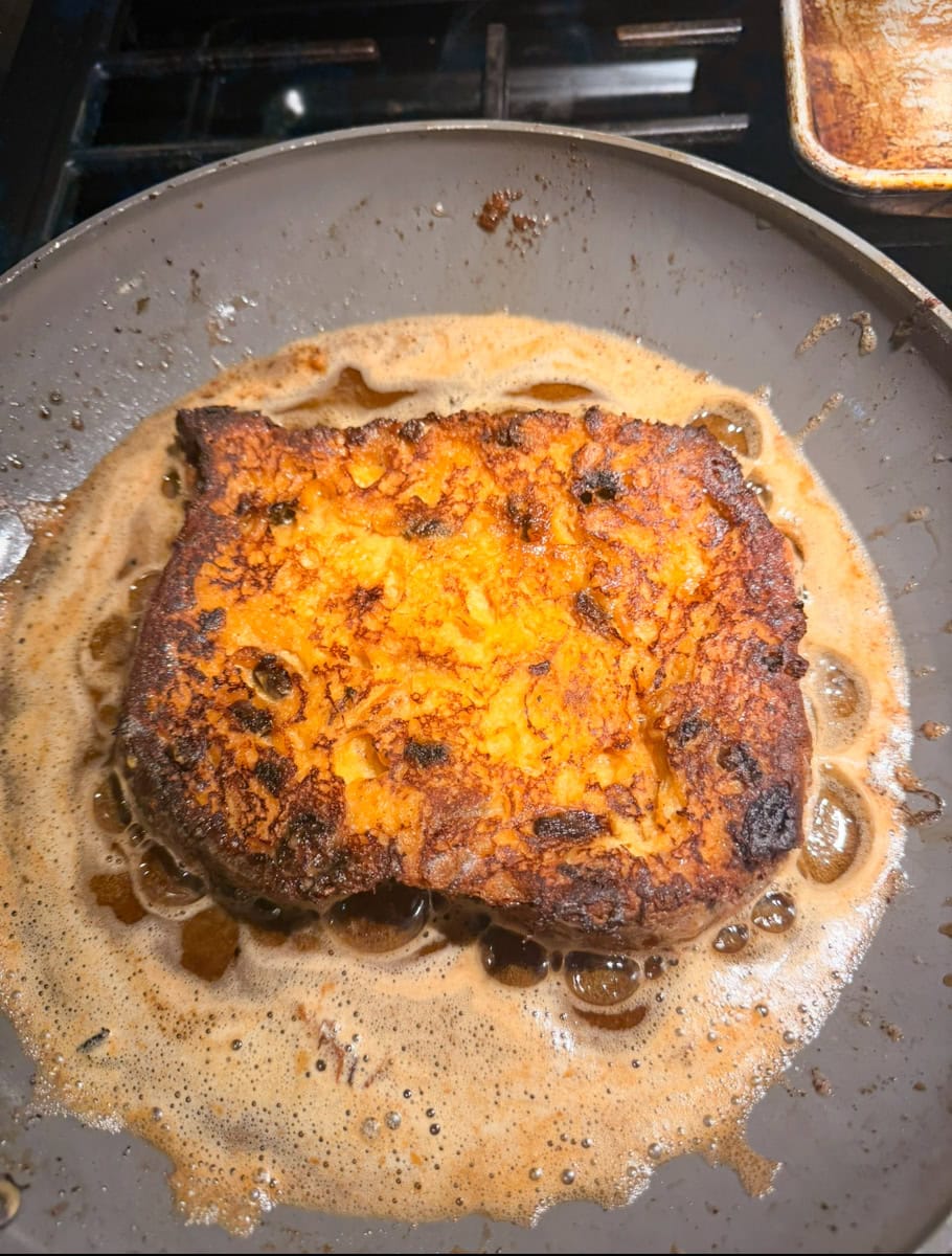 Place the soaked bread onto the hot skillet and cook for 2–3 minutes per side, until golden brown and cooked through.