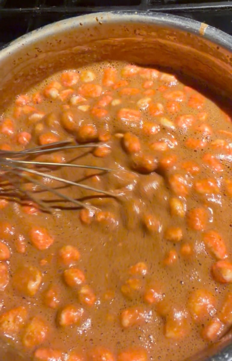 Mix in the half of the peppermint marshmallows until the hot chocolate turns nice and smooth.