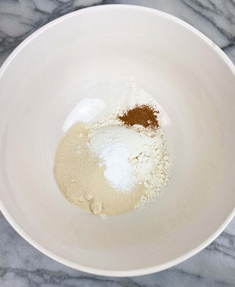 Mix the dry ingredients. In a medium bowl, whisk together the flour, sugar, baking powder, baking soda, sea-salt, and nutmeg until well combined. Set aside.