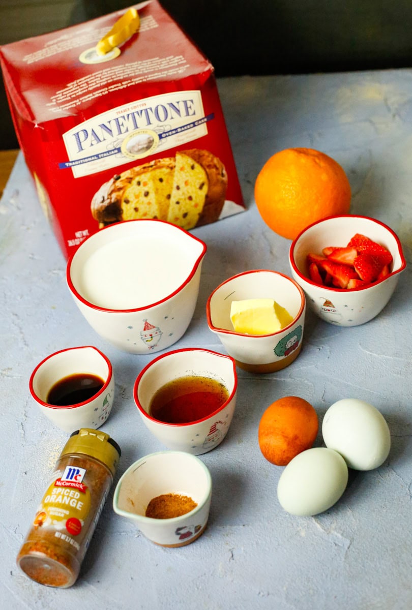 Panettone Bread: The star of the recipe: buttery, airy, and naturally sweet, so it makes French toast taste instantly festive.
Heavy Cream: Creates a rich, thick custard that soaks into the bread and makes the inside soft and luxurious. You can also use whole milk.
Eggs: Help the custard set so each slice cooks up sturdy, fluffy, and custardy (not soggy).
Vanilla Extract: Adds warmth and enhances the sweet, bakery-style flavor of the panettone.
Maple Syrup: Sweetens the custard gently and adds a cozy depth that pairs perfectly with holiday spices.
Nutmeg: Brings that classic Christmas “warm spice” flavor and boosts the panettone’s citrus notes.
Pumpkin Spice: Adds an easy blend of seasonal spices for a holiday brunch vibe without measuring multiple spices.
Melted Butter: (for cooking) — Gives the slices a golden, crisp exterior and rich flavor while frying in the pan.
Orange Zest: Give the Panettone French Toast a delicious citrus flavor and Brightens everything and makes the whole dish taste extra “Christmas morning,” especially with panettone.
Sea Salt: Balances the sweetness and makes the flavors pop (especially the maple + spices).
Fresh Strawberries: Totally optional, but I find adding fresh strawberries to this easy french toast makes it even more delicious and adds texture.
Fresh Whipped Cream: You're not allowed to eat French Toast without fresh whipped cream. It's a rule, look it up. ;)
Spiced Orange Sugar: Gives the french toast a Christmas dusting and it tastes really good! Totally optional, but delicious and refreshing!