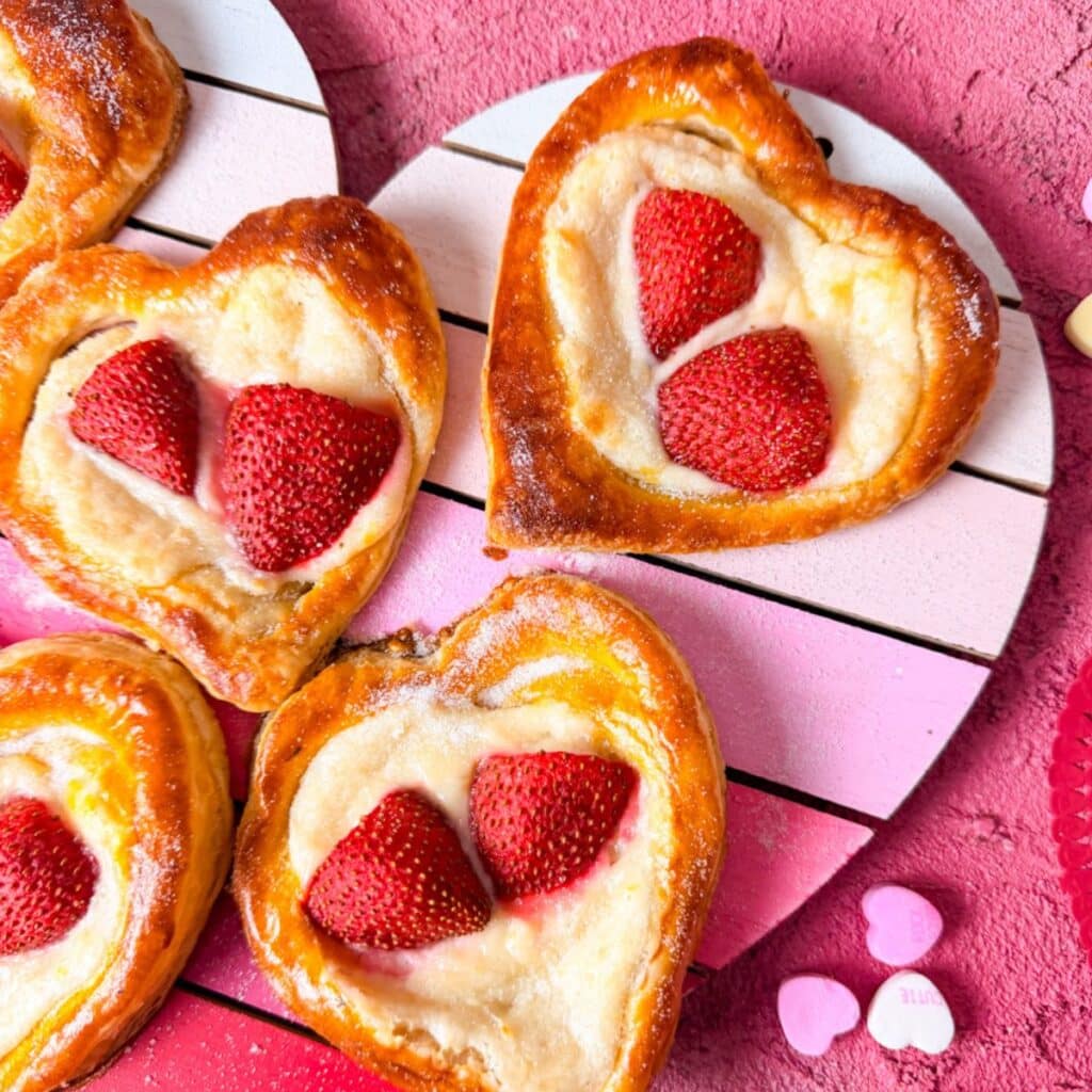 Homemade heart shaped strawberry cream cheese danish recipe with puff pastry
