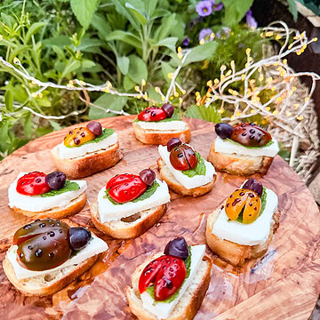 Delicious ladybug-themed crostini bites perfect for spring parties and appetizers. Easy to make and.