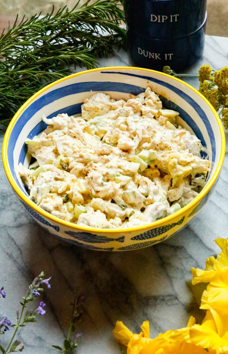 Creamy chicken salad made with rotisserie chicken, celery, dill pickles, and mayonnaise.