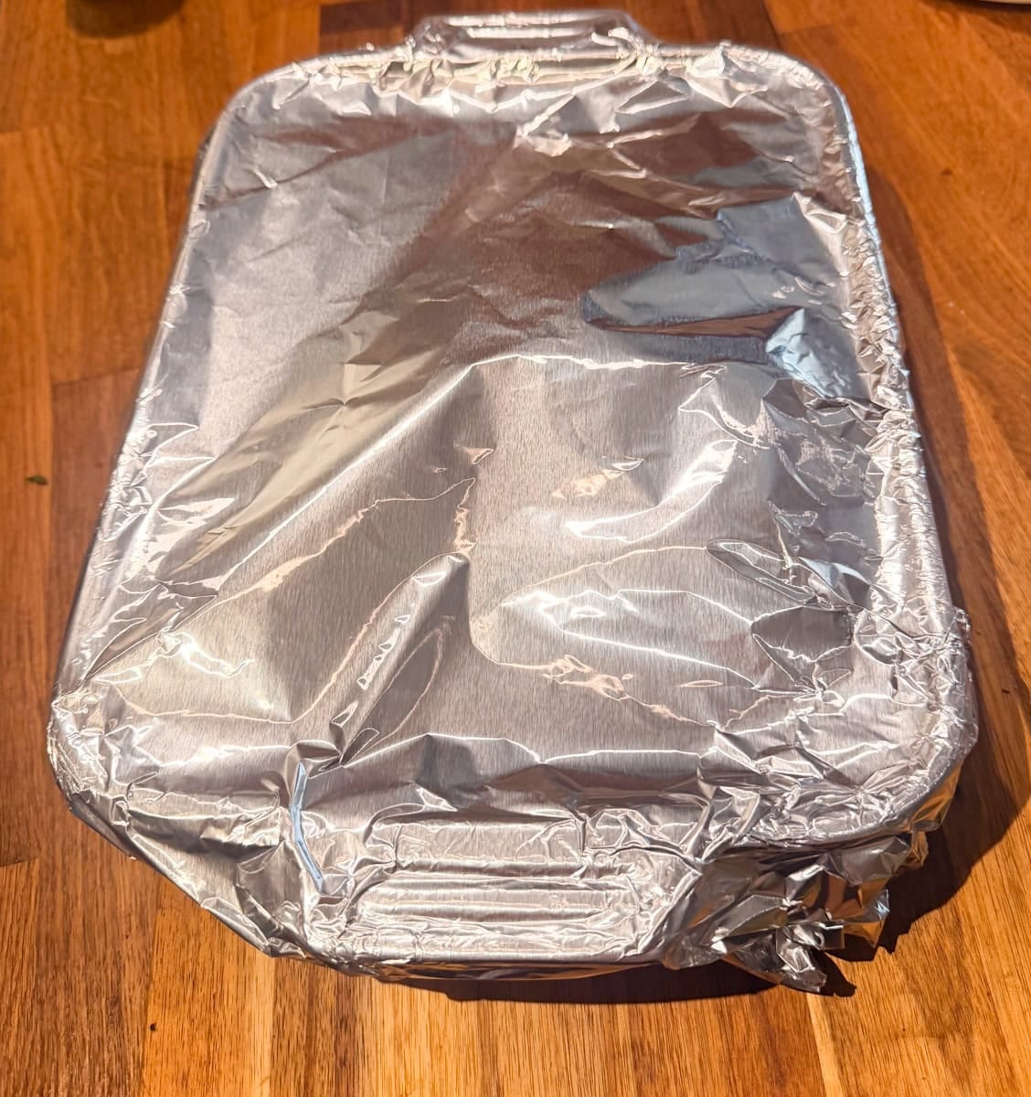 Cover tightly with foil and bake for 45 minutes. Remove the foil and bake another 15–20 minutes, until the squash is tender and the Parmesan is lightly golden