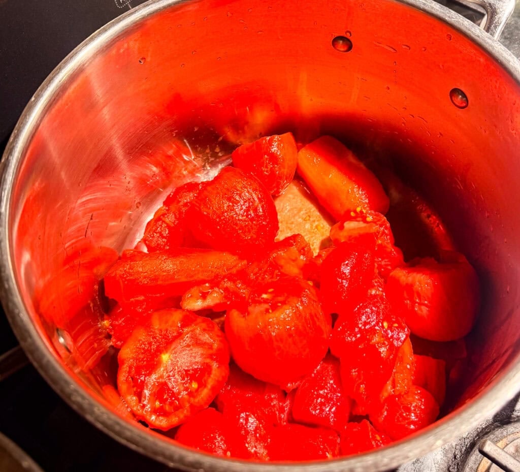 blanch the tomatoes in boiling water