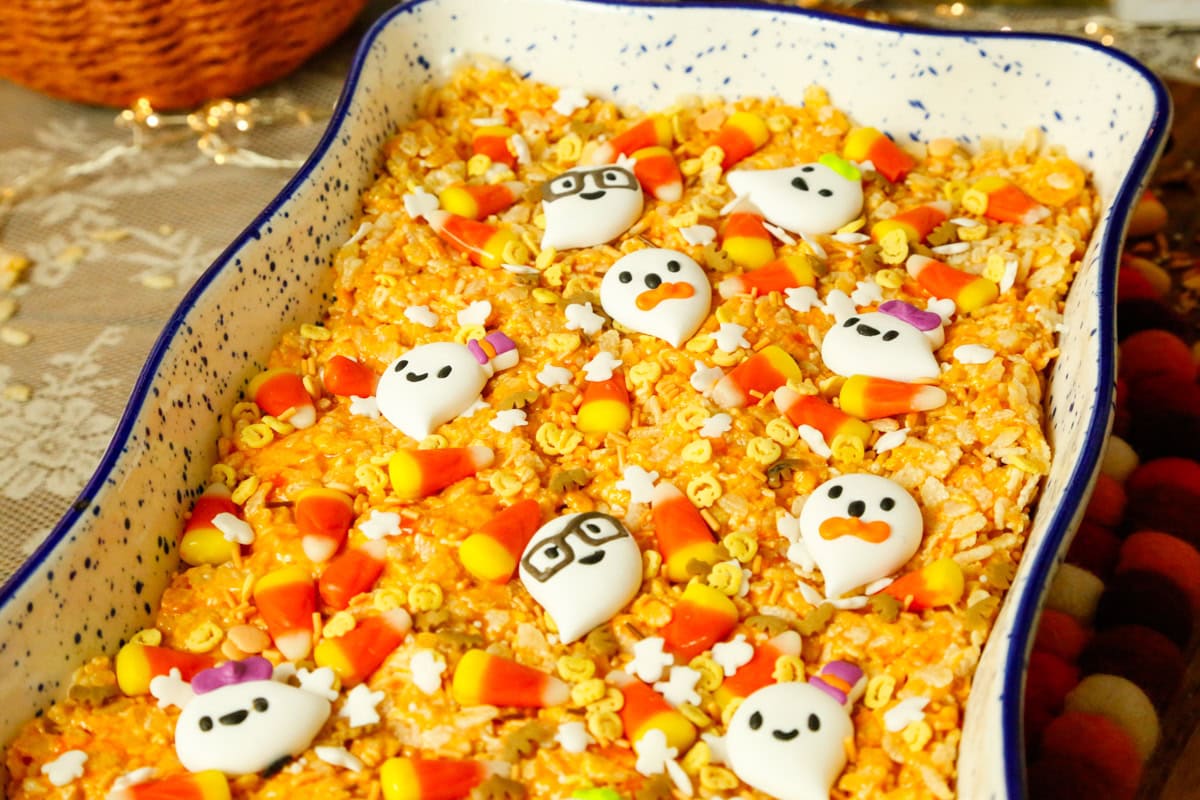 a baking dish full of Halloween themed rice krispies treats